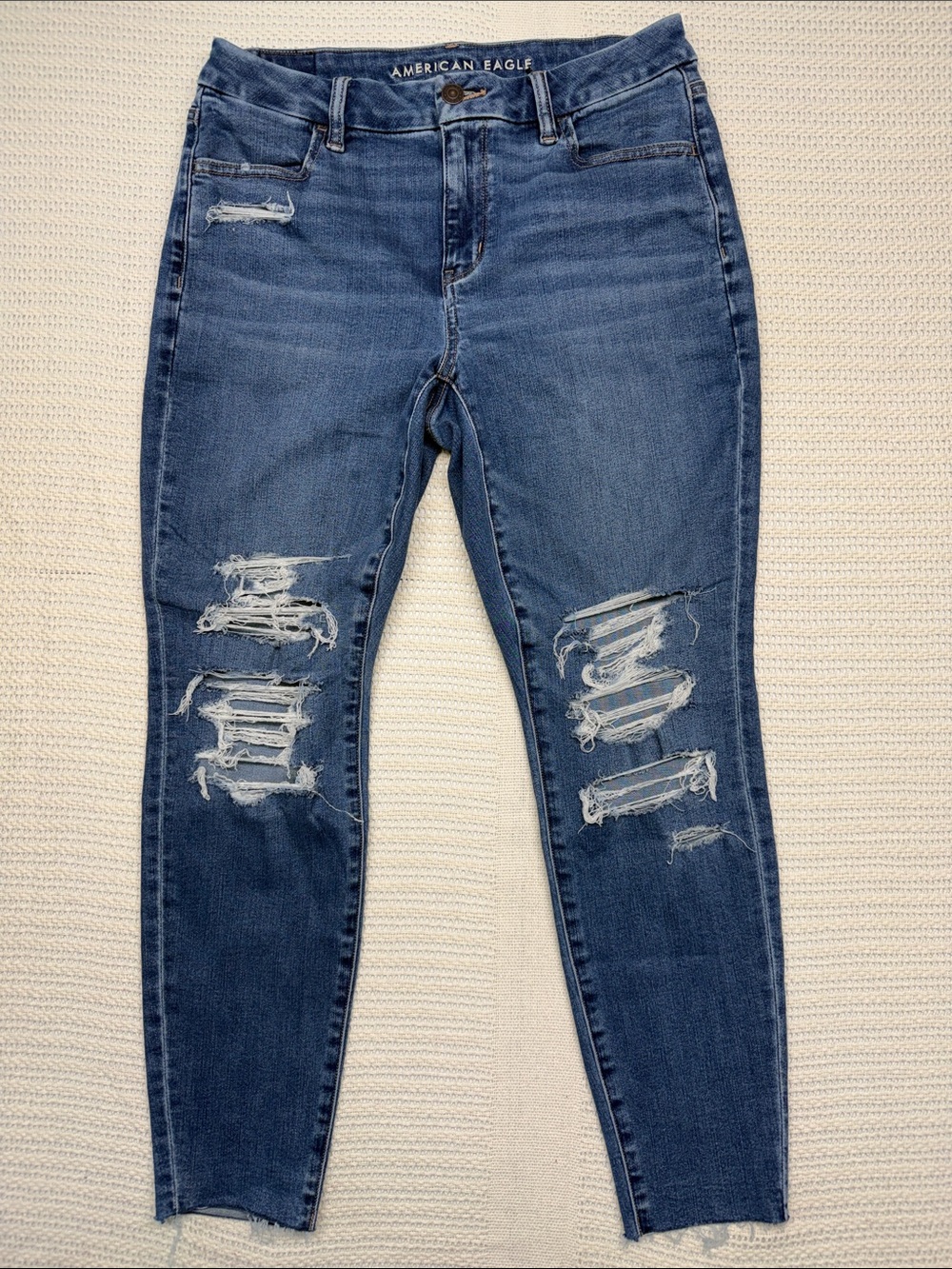 American Eagle Next Level Stretch Curvy High-Rise Blue Distressed Jeggings